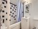 Basement bathroom with a shower/tub combo at 1333 Hanover St, Aurora, CO 80010
