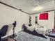 Basement bedroom with gray rug and string lights at 1333 Hanover St, Aurora, CO 80010