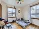 Cozy bedroom with hardwood floors and ample natural light at 1333 Hanover St, Aurora, CO 80010