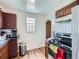 Efficient kitchen with wood cabinets and appliances at 1333 Hanover St, Aurora, CO 80010