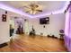 Spacious living room with hardwood floors and ceiling fan at 1333 Hanover St, Aurora, CO 80010