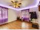 Bright living room with hardwood floors and ceiling fan at 1333 Hanover St, Aurora, CO 80010