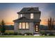 Two-story home with stone and siding exterior, complemented by manicured landscaping at 23762 E 33Rd Pl, Aurora, CO 80019