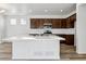 Bright kitchen with center island, stainless steel appliances, and modern fixtures at 23762 E 33Rd Pl, Aurora, CO 80019