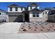Charming two-story home featuring a well-manicured front yard and a two car garage at 4194 Ridgewalk Pt, Castle Rock, CO 80108