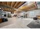 Unfinished basement with exposed ceiling, concrete floor, and ample storage space at 1839 Pinion Wing Cir, Castle Rock, CO 80108