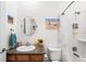 Cozy bathroom features a shower/tub, framed art and modern sink at 14805 Quince Way, Thornton, CO 80602
