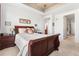 Relaxing primary bedroom featuring a trey ceiling, and an ensuite bathroom, providing privacy and comfort at 14805 Quince Way, Thornton, CO 80602
