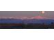 Scenic mountain view at sunset with a full moon rising above the snow-capped peaks at 14805 Quince Way, Thornton, CO 80602