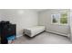 Bright bedroom with carpet, large window and closet at 5995 W Hampden Ave # 18C, Denver, CO 80227