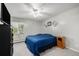 Comfortable main bedroom features neutral carpet and ceiling fan at 5995 W Hampden Ave # 18C, Denver, CO 80227