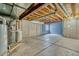 Spacious unfinished basement with concrete floor and exposed ceiling, ready for your personal touches at 10049 Granby Dr, Commerce City, CO 80022