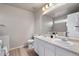 Neutral bathroom with dual sink vanity, and a combined shower and bathtub at 10049 Granby Dr, Commerce City, CO 80022