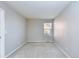Neutral bedroom featuring carpet, natural light, and closet space at 10049 Granby Dr, Commerce City, CO 80022