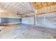 Spacious three car garage with high ceilings and room for vehicles and storage at 10049 Granby Dr, Commerce City, CO 80022