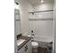 Bathroom features modern vanity, shower and tub combination and black hardware and fixtures at 14295 Currant St, Broomfield, CO 80020
