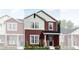Charming two-story home with a combination of siding, complemented by professionally landscaped front yard at 14295 Currant St, Broomfield, CO 80020