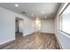 Open living space with hardwood floors and lots of natural light at 3446 S Clay St, Englewood, CO 80110