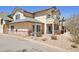 Exterior view of condo building with gravel landscaping and balconies at 8653 E Dry Creek Rd # 1114, Englewood, CO 80112