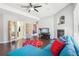 Cozy living room featuring a fireplace and comfortable blue sectional at 8653 E Dry Creek Rd # 1114, Englewood, CO 80112