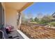 Outdoor patio with brick walls and a view of the green lawn at 8653 E Dry Creek Rd # 1114, Englewood, CO 80112
