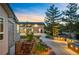 Beautiful backyard showcasing a detached garage and manicured landscaping at 13087 W 27Th Ln, Golden, CO 80401