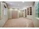 Basement bedroom with closet and built-in shelving, providing ample storage at 13087 W 27Th Ln, Golden, CO 80401