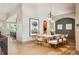 Elegant dining room with modern lighting and an open-concept design at 13087 W 27Th Ln, Golden, CO 80401