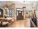 Inviting foyer with high ceilings and modern decor, leading to office and dining areas at 13087 W 27Th Ln, Golden, CO 80401