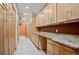 Large kitchen pantry includes generous cabinet space for all your groceries and supplies at 13087 W 27Th Ln, Golden, CO 80401