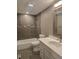 Nicely renovated bathroom with modern tile, a shower over tub, and stylish vanity at 795 Vivian Ct, Lakewood, CO 80401