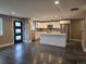 Open concept kitchen with an island and stainless steel appliances adjoins the dining area at 795 Vivian Ct, Lakewood, CO 80401