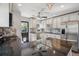 Well-appointed kitchen featuring granite countertops, stainless steel appliances, and stylish cabinetry at 765 Iola St, Aurora, CO 80010