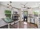 Well-appointed kitchen featuring granite countertops, stainless steel appliances, and contemporary pendant lighting at 765 Iola St, Aurora, CO 80010