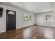 Inviting living room featuring hardwood floors, natural light, and neutral paint, perfect for entertaining at 765 Iola St, Aurora, CO 80010