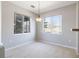Inviting dining area with large windows and ample natural light at 8358 S Independence # 107, Littleton, CO 80128