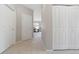 Hallway view leading into the living room at 8358 S Independence # 107, Littleton, CO 80128