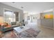 Open concept living area featuring abundant natural light and neutral tones at 8358 S Independence # 107, Littleton, CO 80128