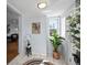 Bright foyer with tile flooring, decor and natural light at 2301 E Yale Ave, Denver, CO 80210