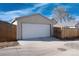 Detached garage with wide driveway and alley access at 2301 E Yale Ave, Denver, CO 80210