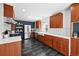 Modern kitchen with stainless steel appliances and ample counter space at 2301 E Yale Ave, Denver, CO 80210