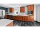 Bright kitchen features wooden cabinets, white countertops, subway tile backsplash, and stainless steel appliances at 2301 E Yale Ave, Denver, CO 80210
