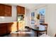 Charming kitchen featuring stylish cabinets, and direct access to the backyard at 2301 E Yale Ave, Denver, CO 80210