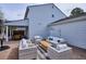 Large brick patio and backyard featuring ample seating, perfect for outdoor gatherings and relaxation at 7343 S Ivy Way, Centennial, CO 80112