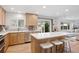 Bright and modern kitchen with stainless steel appliances and a kitchen island at 7343 S Ivy Way, Centennial, CO 80112