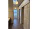 Bright bathroom featuring tile flooring, dual closets, and modern lighting at 4663 S Fraser Ct # C, Aurora, CO 80015