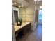 Bathroom with plenty of counter space, a vanity and tiled flooring at 4663 S Fraser Ct # C, Aurora, CO 80015