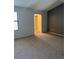 Neutral bedroom with gray walls, standard window, and carpeted flooring at 4663 S Fraser Ct # C, Aurora, CO 80015