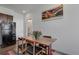 Cozy dining area with modern furnishings and an eye-catching piece of artwork at 11440 E Martin Luther King Jr Blvd, Denver, CO 80238