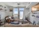 Bright living room boasting stylish furniture, a ceiling fan, and ample natural light at 11440 E Martin Luther King Jr Blvd, Denver, CO 80238